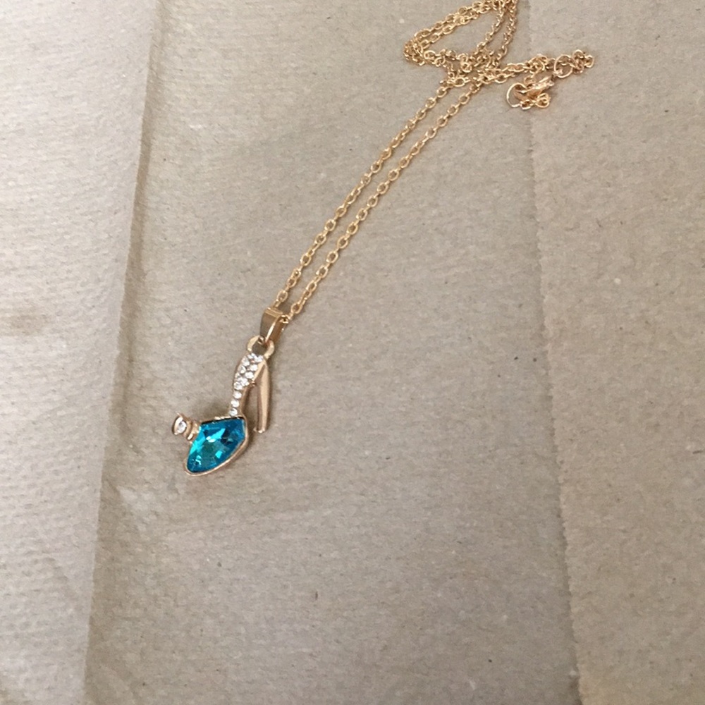High heel gold tone necklace